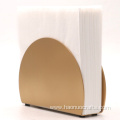 Golden minimalist semi-circular tissue storage rack